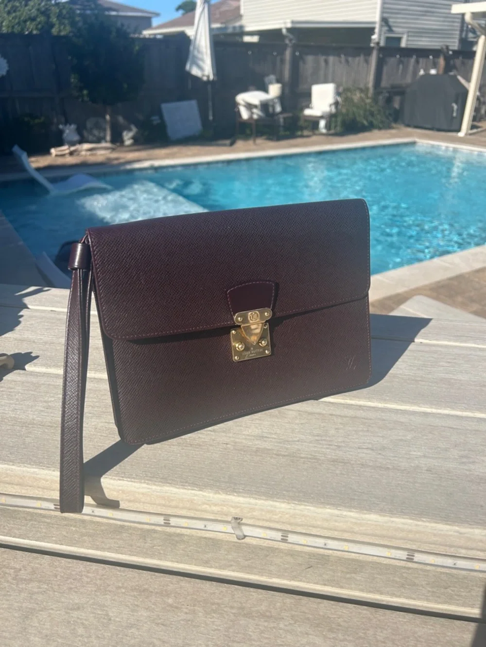 Louis Vuitton Taiga Kourad Clutch